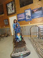IMG 7641  Mommy, Megan, Phelan on a dog sled, Seavey's Iditaride, Seward, AK