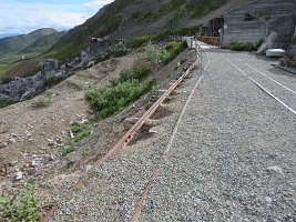 IMG 5660  Note that there isn't always solid ground between the rails.  Assuming that there was, Winston almost fell, backing up to try to take a wider angle photo. Independence Mine State Historical Park, AK